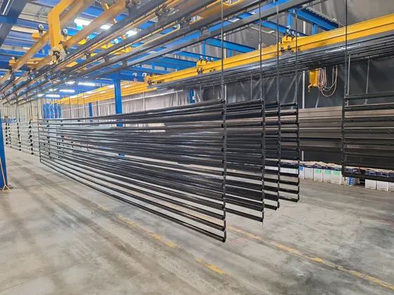 Metal parts on industrial powder coating line